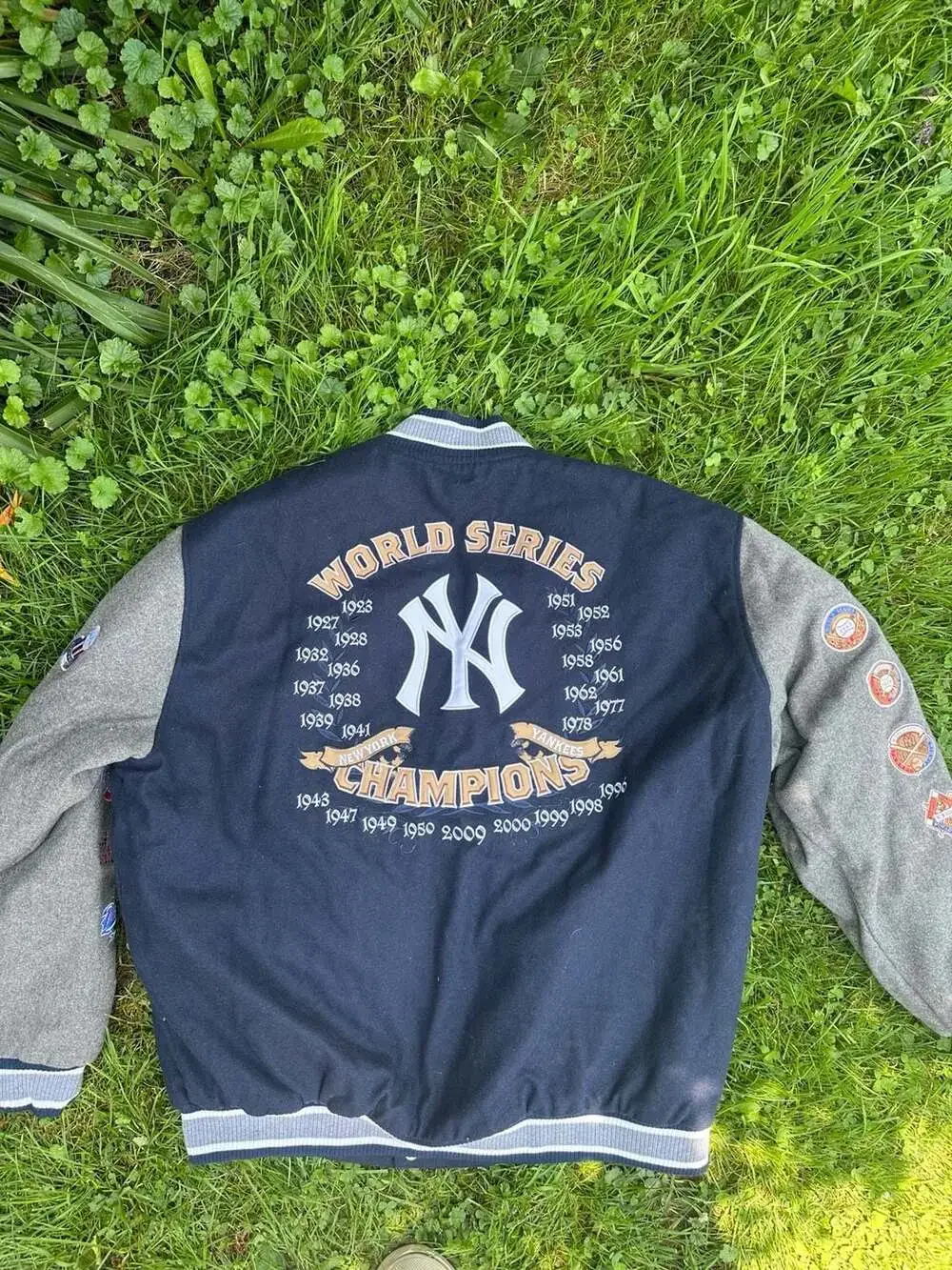 New York Yankees MLB World Series Champions Varsity Jacket with Patchwork Sleeve